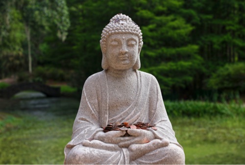Buddha holding coins